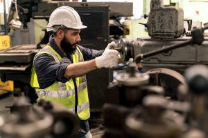Millwrights aligning machinery during downtime.
Caption: “Precision alignment extends equipment lifespan and prevents costly failures.