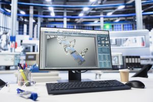 eam of engineers collaborating using 3D virtual models of an industrial plant