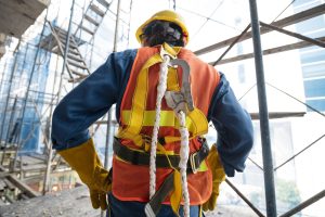 Safety officers or employees conducting a safety audit or inspection in an industrial facility.