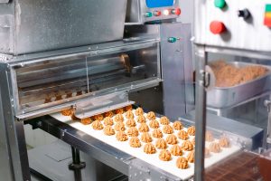 Modern conveyor system in a hygienic food processing facility for efficient product flow